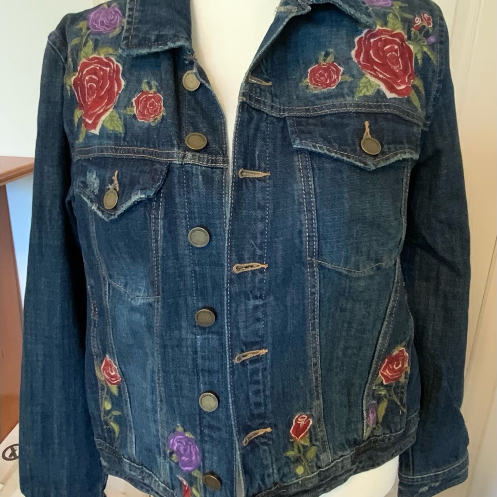 Jean jacket with flower embroidery and slight distressing